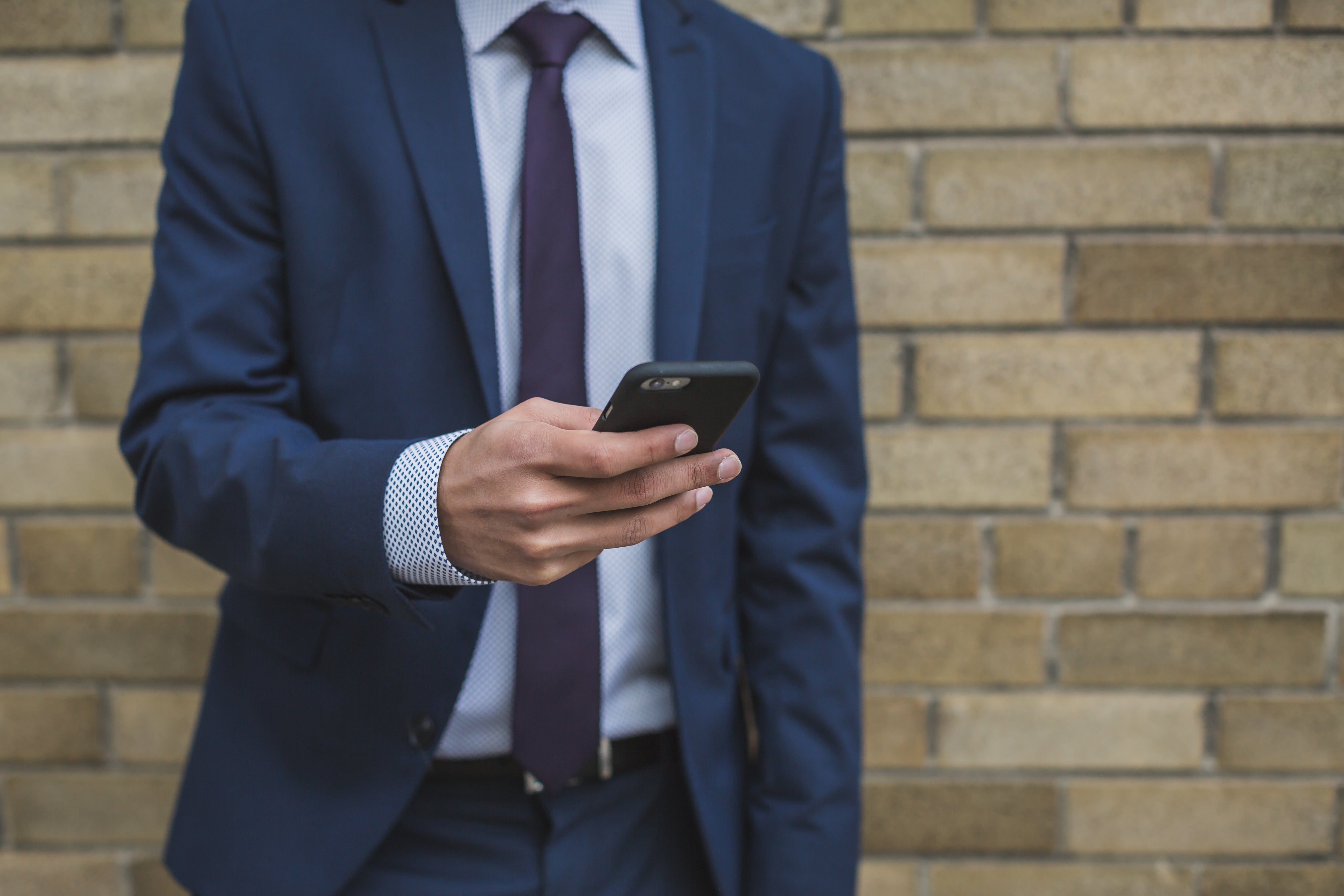 files/businessman-on-smartphone.jpg